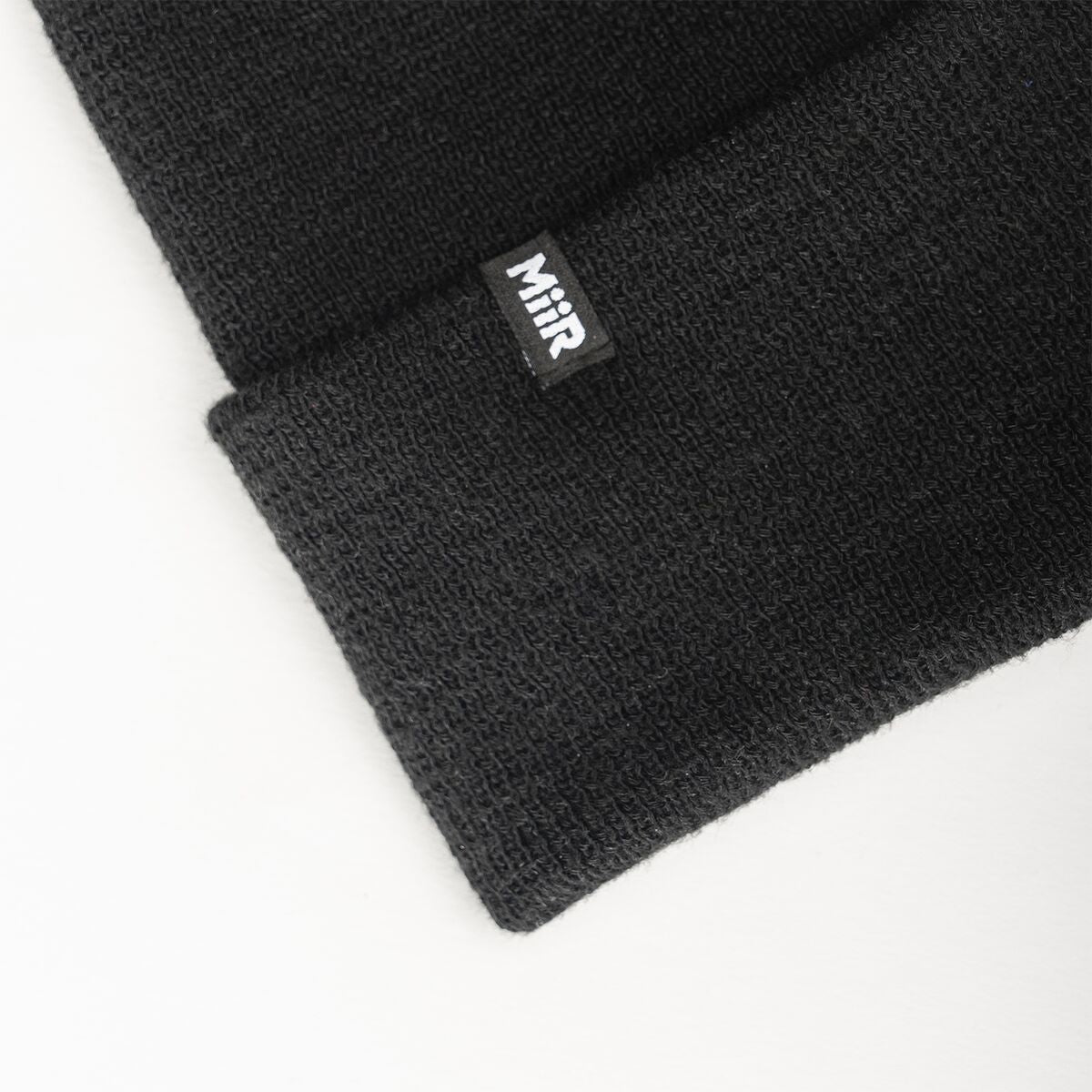 recycled-poly-fine-knit-beanie-n8 WebPDP-RecycledPolyFineKnitBeanie_Studio_TagDetail_Black__BNE005002OS.jpg