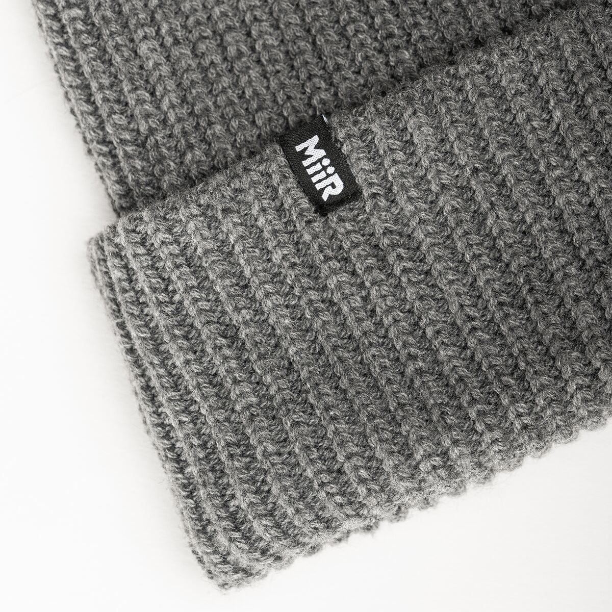 jodie-williams-beanie-g5 WebPDP-RecycledPolyRibBeanie_Studio_TagDetail_GrayHeather__BNE002400OS.jpg